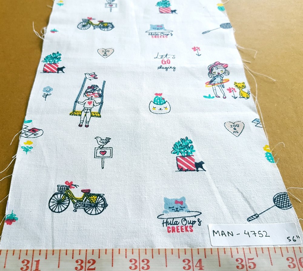 Cotton print fabric in children's playtime print with swings, cats, bicycles, badminton rackets