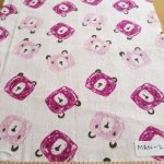 Cotton flannel fabric, in pink bear face geometric print