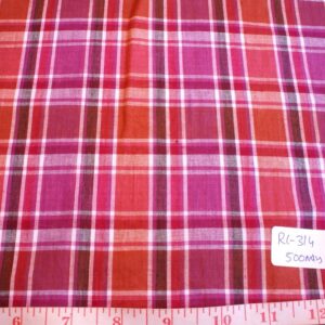 Madras fabric in fuschia, red, brown and white plaid