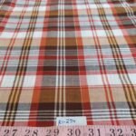 Madras fabric - plaid madras made of Indian cotton yarns of different colors suitable for menswear and children's apparel.