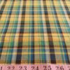 Madras Plaid Fabric or madras cloth, woven in a plaid pattern, for men's shirts, jackets, ties and bowties. Also known as check fabrics.