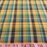 Madras Plaid Fabric or madras cloth, woven in a plaid pattern, for men's shirts, jackets, ties and bowties. Also known as check fabrics.