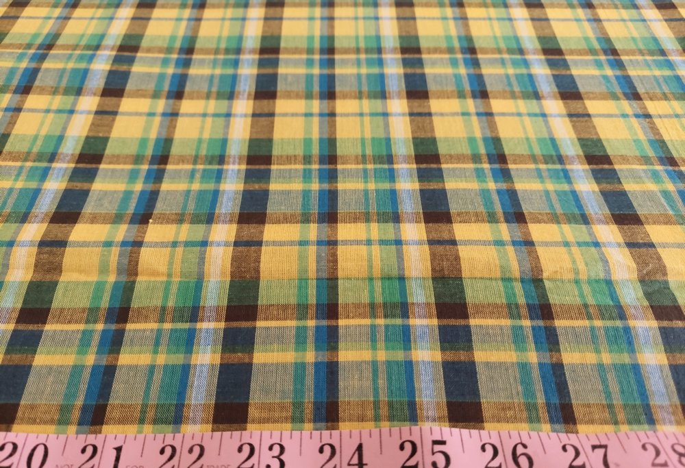 Madras Plaid Fabric or madras cloth, woven in a plaid pattern, for men's shirts, jackets, ties and bowties. Also known as check fabrics.