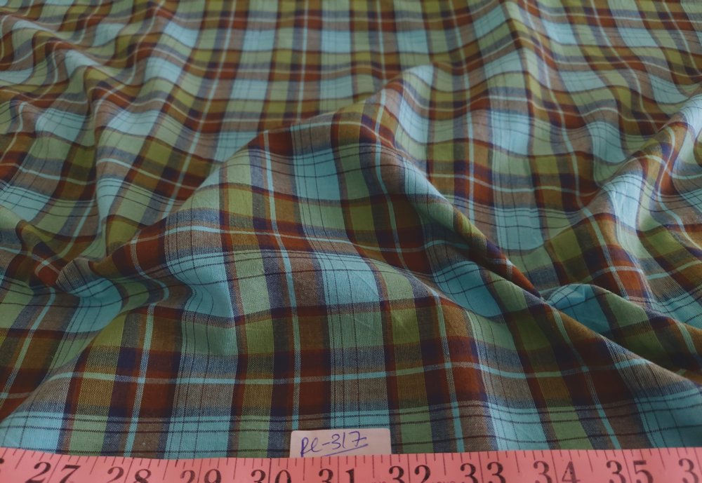 Madras fabric in light indigo, brown and army green colors