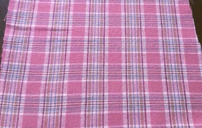 Bleeding Madras Fabric, or bleeding madras, made by weaving together yarns of several colors into plaid patterns, wherein the yarns are dyed using vegetable dyes that "bleed" over time, giving the fabric a vintage blend of colors, ideal for vintage shirts, menswear and classic clothing.