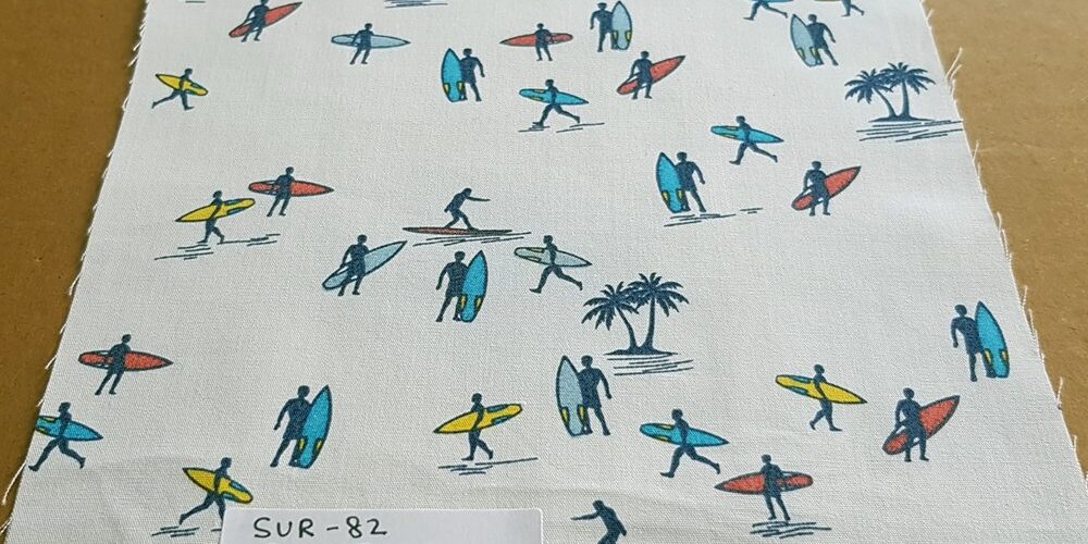 Surfers & Surfboards" Nautical theme print fabric in cotton, perfect for beach shirts, beach shorts, childrens apparel, holiday and resort clothing.