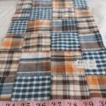Patchwork Madras or patchwork plaid - a preppy fabric made of plaid fabric of various colors, for preppy children's & men's clothing.