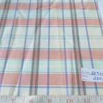 Plaid Fabric or madras plaid is made of cotton yarns in a plaid pattern. It is a summer preppy fabric, for shirting, menswear, kids clothing and beach wear.