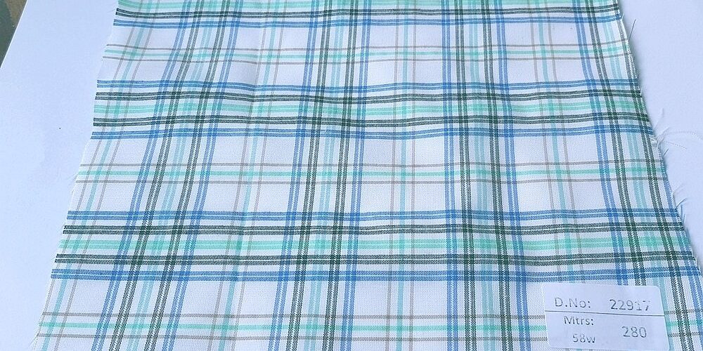 Madras Plaid Fabric made of cotton yarns woven in a plaid pattern, for men's shirts, jackets, ties, bowties and plaid clothing. Also known as check fabrics.