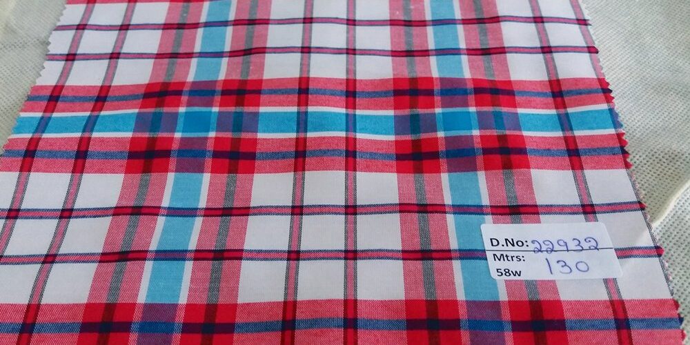 Plaid Fabric or check fabric, made of cotton woven in a plaid pattern, for madras shirts, madras jackets, ties, bowties & pet clothing.