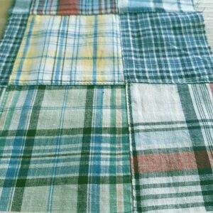 Patchwork Plaid - Madras cotton plaid fabric patches sewn together into a fabric ideal for preppy clothing, kid's clothing and menswear.