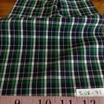 Tattersall Plaid or Tattersall Check Fabric, with vertical stripes that repeat horizontally, forming squares, for children's clothing and menswear.