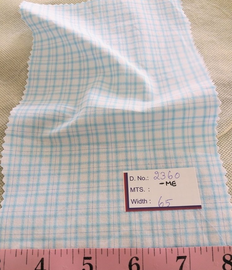 Plaid Fabric or check fabric, made of cotton woven in a plaid pattern, for madras shirts, madras jackets, ties, bowties & pet clothing.Plaid Fabric or check fabric, made of cotton woven in a plaid pattern, for madras shirts, madras jackets, ties, bowties & pet clothing.