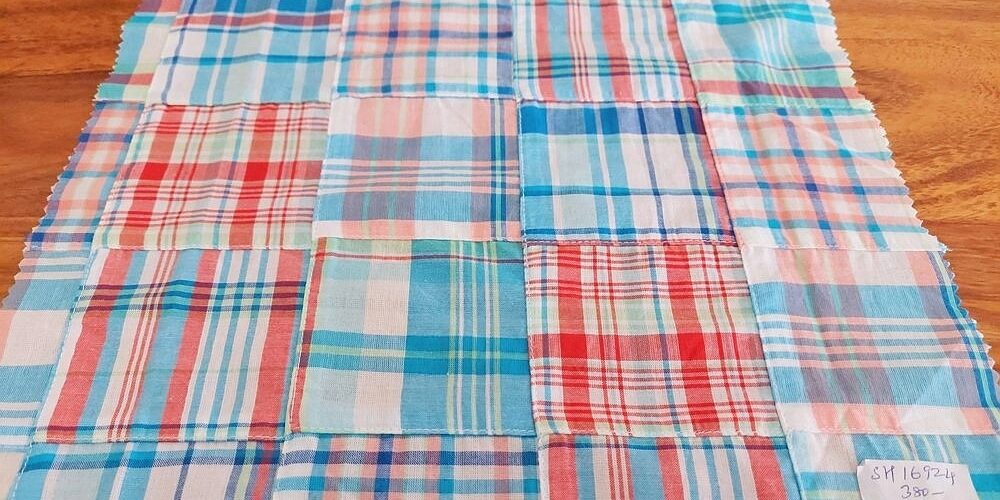 Patchwork Madras - patchwork plaid fabric made of madras plaids of various colors, used for preppy menswear & classic children's clothing.