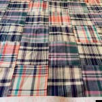Patchwork Madras - patchwork plaid fabric made of madras plaids of various colors, used for preppy menswear & classic children's clothing.