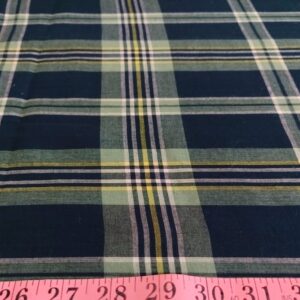 Plaid Fabric or madras cloth, made of cotton, used for plaid shirts, vintage menswear, plaid ties and bowties and classic children's clothing.