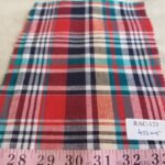Madras Plaid Fabric or madras cloth, woven in a plaid pattern, for shirts, jackets, ties and bowties, dog bandanas & bows.