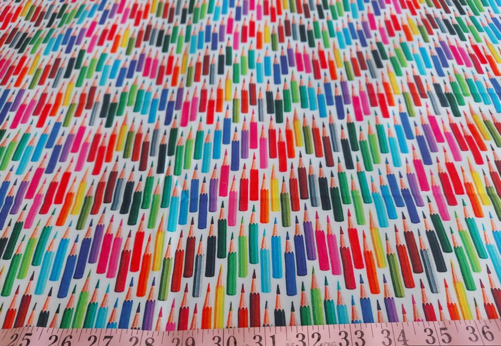 Cotton print fabric in color pencils print theme, with color pencils, for children's clothing, quilting, sewing and dresses.