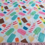 Novelty print fabric, for children's clothing, dog bandanas and quilting, with ice creams, cones and popsicle theme print.