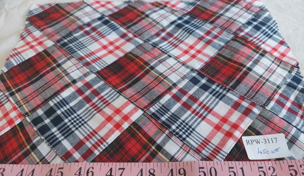 Diamond Patchwork Plaid fabric made of plaids sewn together into patchwork, like an argyle.