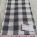 Windowpane plaid or windowpane check, is a shirting plaid fabric, often made of cotton, used for shirts, menswear, ties & bowties.