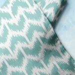 Geometric Abstract print fabric with intersecting abstract motifs printed, for shirts, dog bandanas, clothing & quilting.