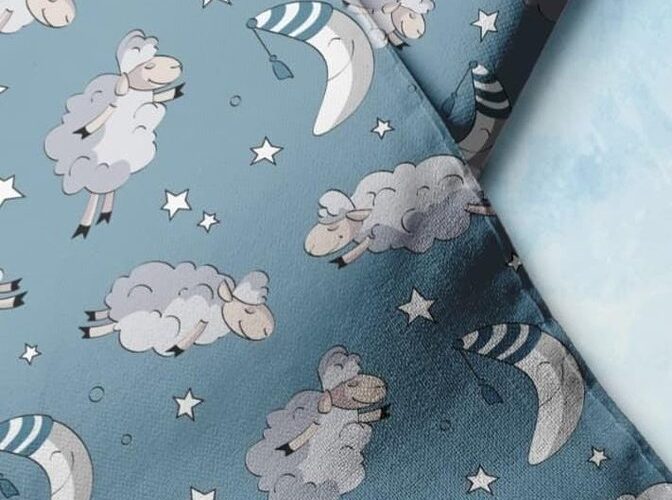 Clouds & moon novelty print fabric with wooly sheep & stars for children's clothing, dog bandanas, skirts & dresses.