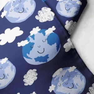 Novelty Print Fabric with Earth smiling & clouds printed, for sewing children's clothing, dresses, dog bandanas and bows.