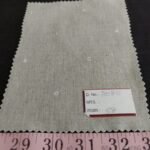 Novelty print fabric, for children's clothing, dog bandanas and quilting, with alphabets and numbers print on heather gray.