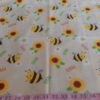 Cotton print fabric with bees and sunflowers, for dog bandanas, bowties, children's clothing, quilting, sewing and dresses.