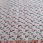 Cotton print fabric with hearts and love theme, for dog bandanas, bowties, children's clothing, quilting, sewing and dresses.