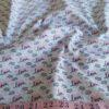 Cotton print fabric with hearts and love theme, for dog bandanas, bowties, children's clothing, quilting, sewing and dresses.