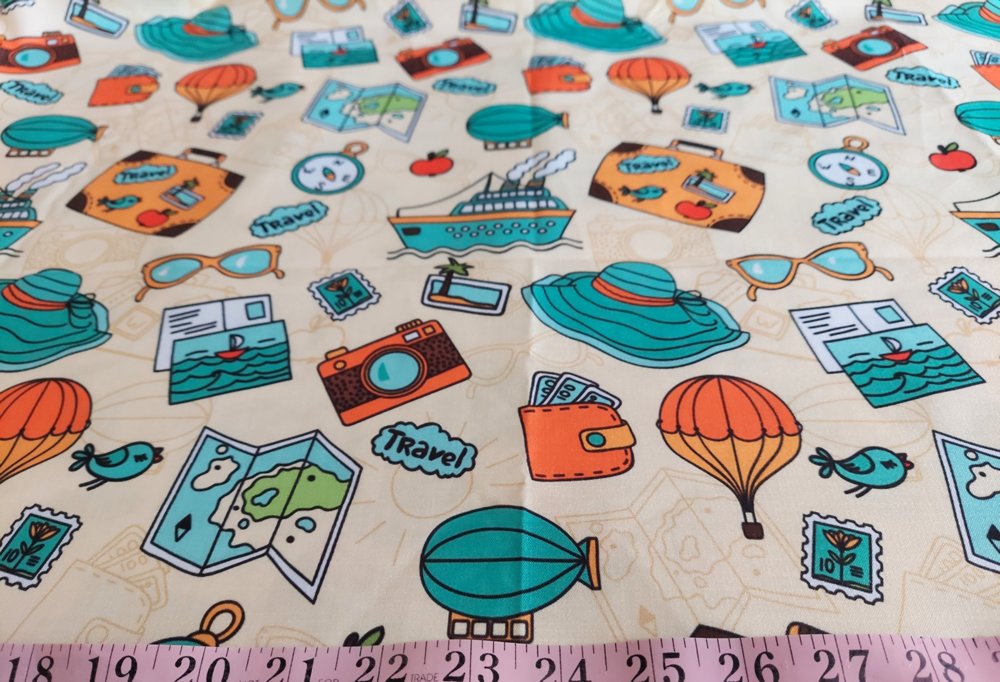 Cotton print fabric in travel and holiday theme, with travel bags, for children's clothing, quilting, sewing and dresses.
