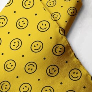 Emoji print fabric, with smiling emojis, for sewing children's clothing, dresses, dog & cat bandanas and bows, & crafts.