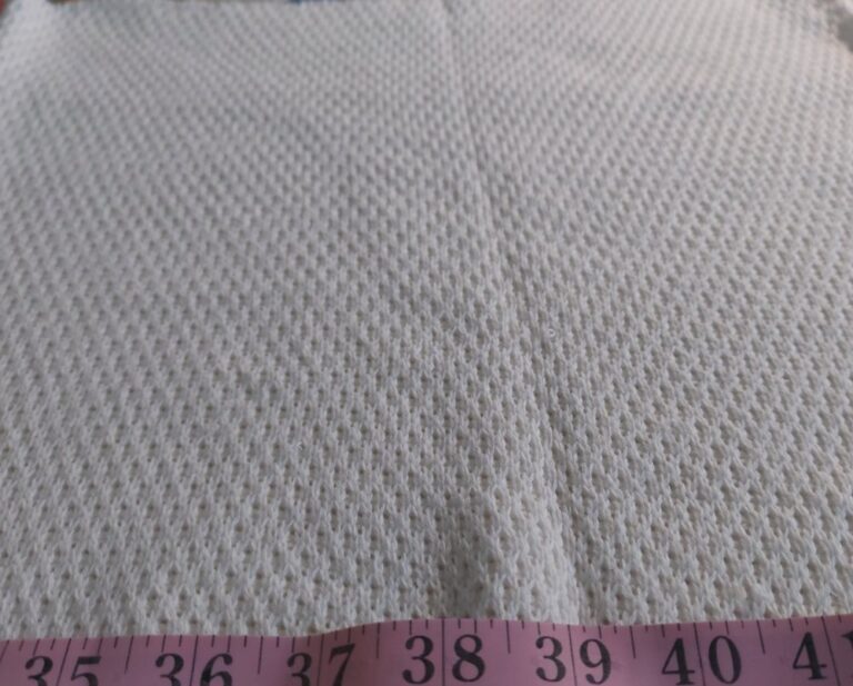 Organic cotton fabric with an eyelet knit pattern, for eco & organic