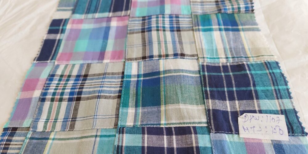 Patchwork plaid fabric made of individual plaids sewn together & used for plaid jackets, shirts, handmade children's clothing.
