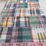 Patchwork Madras or patchwork plaid - a preppy fabric made of plaid fabric of various colors, for preppy children's & men's clothing.