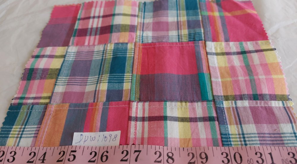 Patchwork Madras or patchwork plaid - a preppy fabric made of plaid fabric of various colors, for preppy children's & men's clothing.