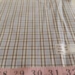 Windowpane plaid or windowpane check, made of square plaids, in different colors, used for shirts, menswear, ties & bowties.