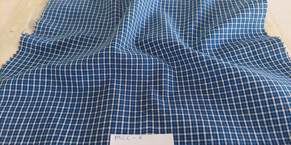 Windowpane plaid or windowpane check, is a shirting plaid fabric, often made of cotton, used for shirts, menswear, ties & bowties.