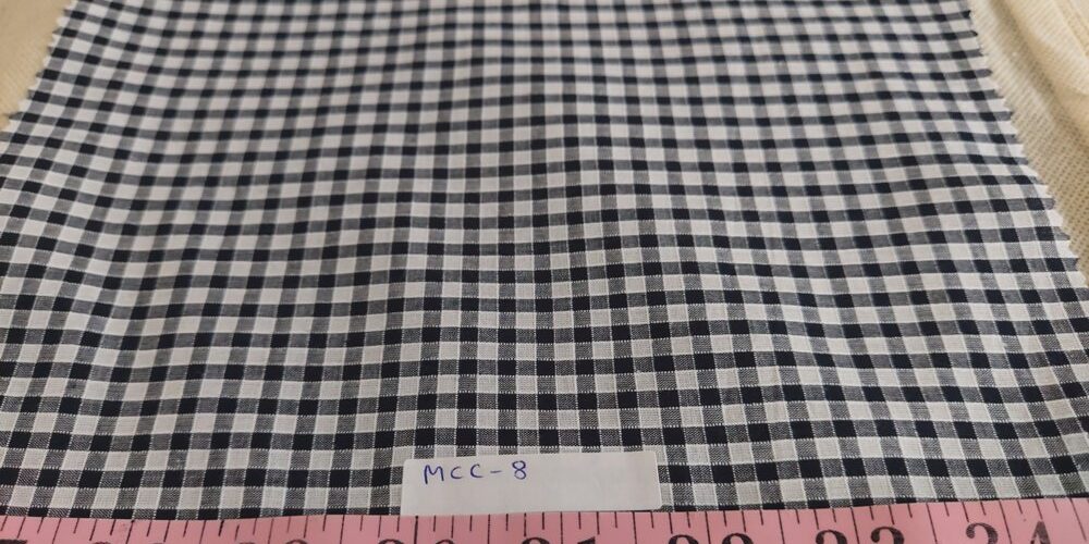Windowpane plaid or windowpane check, is a shirting plaid fabric, often made of cotton, used for shirts, menswear, ties & bowties.