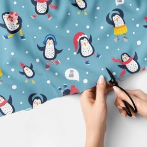 Novelty Print fabric with penguins dancing in the snow, for handmade children's clothing, dog bandanas, Quilting & skirts.
