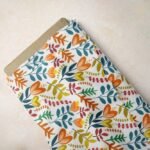 Novelty Print Fabric with flowers and leaves printed, for sewing children's clothing, dresses, dog bandanas and bows.