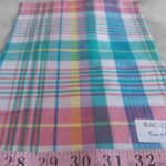 Madras fabric - plaid madras made of Indian cotton yarns of different colors suitable for menswear and children's apparel.