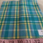 Madras fabric - plaid madras made of Indian cotton yarns of different colors suitable for menswear and children's apparel.