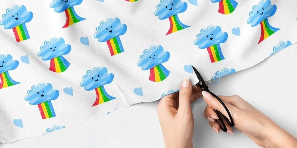 Novelty Print Rainbow clouds and hearts fabric with multi-color stripes for children's clothing, dog bandanas, skirts & dresses.