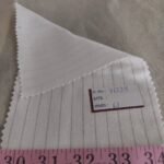 Double faced reversible fabric also known as double cloth fabric, for shirts, jackets, outerwear, skirts, dresses and coats.