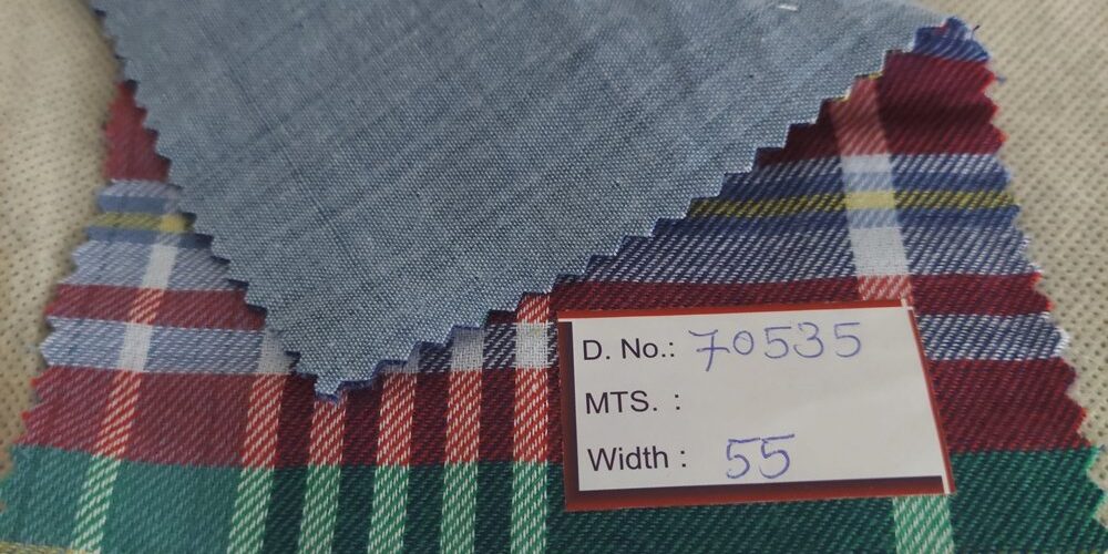 Double faced reversible fabric also known as double cloth fabric, for shirts, jackets, outerwear, skirts, dresses and coats.