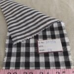 Double faced reversible fabric also known as double cloth fabric, for reversible jackets, shirts, outerwear, skirts, and coats.