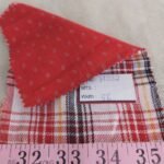 Double faced reversible fabric also known as double cloth fabric, for reversible jackets, shirts, outerwear, skirts, and coats.